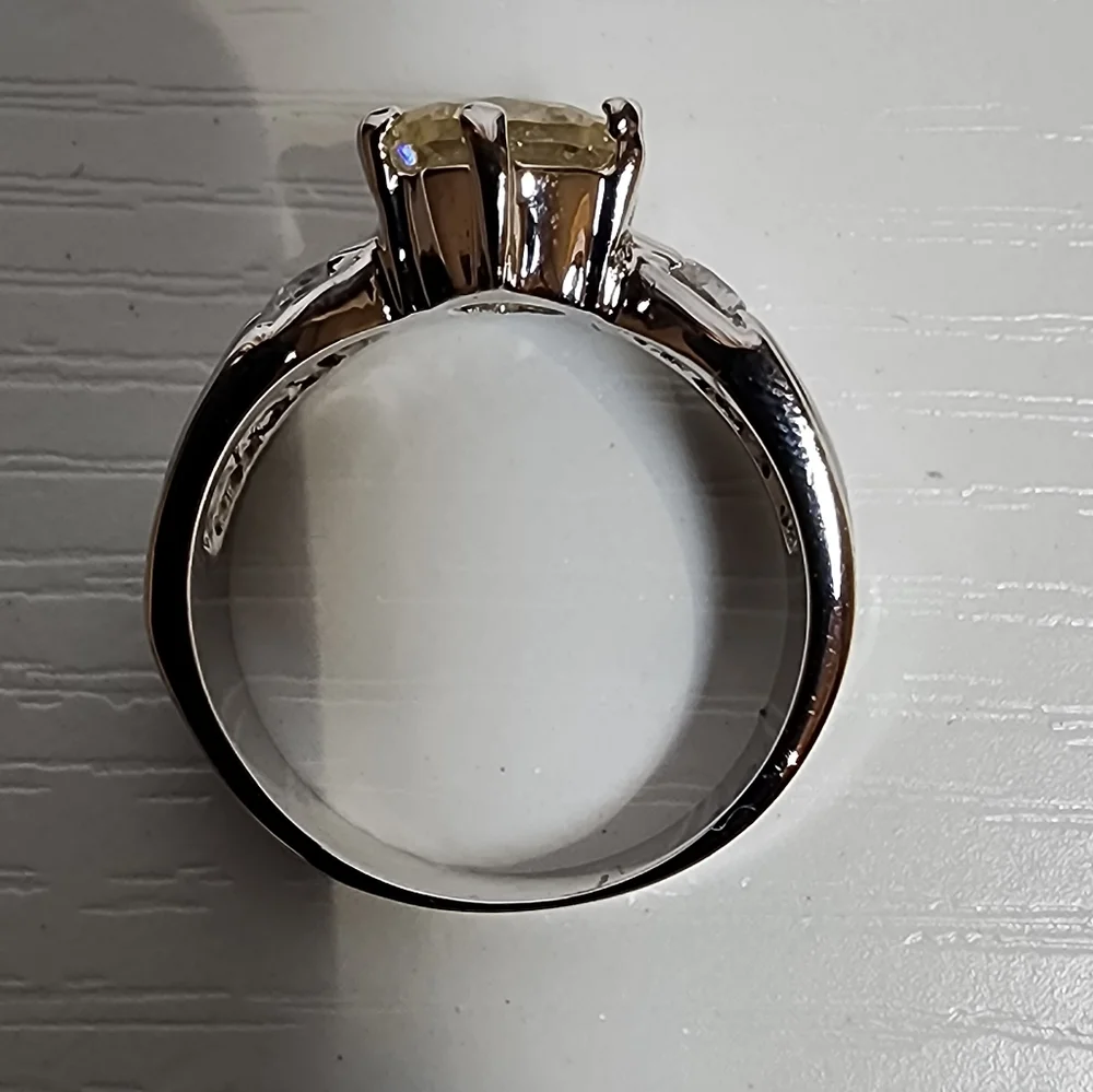 Silver Tone Ring With Large Light Yellow Gemstone